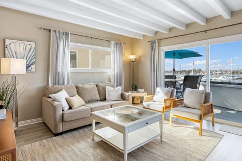 Bright and airy living space with stunning waterfront views.