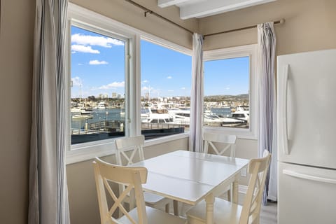 Cozy dining setup with seating for four.