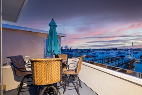 Private balcony overlooking the tranquil waterfront.