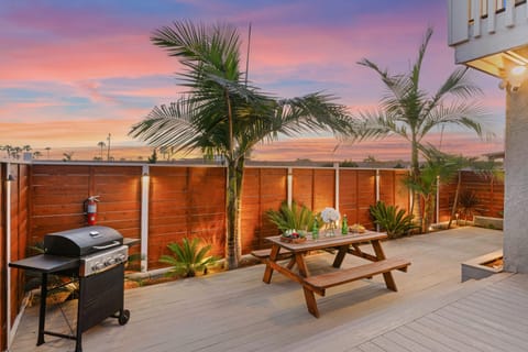 BBQ grill and al fresco dining table.