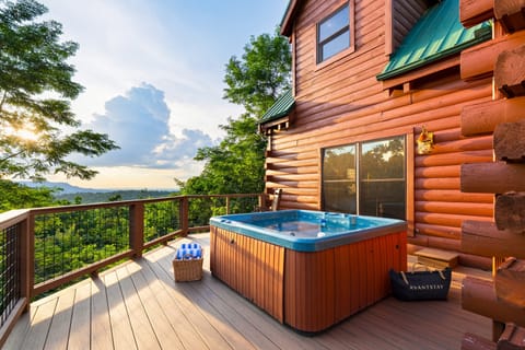 Inviting hot tub on the deck, perfect for unwinding as you take in the sunset views.