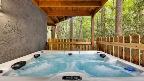 Soak up in your private hot tub.