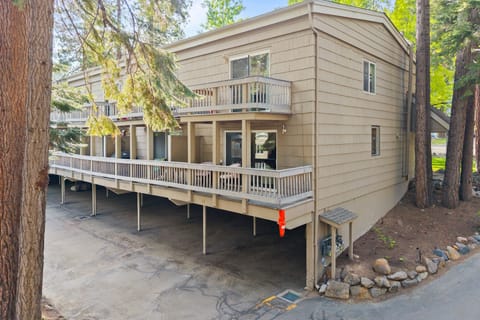 Exterior view of the building nestled among the trees.