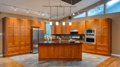 Sleek, modern kitchen with stainless steel appliances.