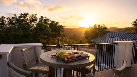Enjoy a golden hour dinner on your private balcony.