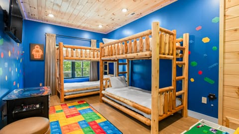 Bedroom 4 features 2 twin-over-twin bunk beds.