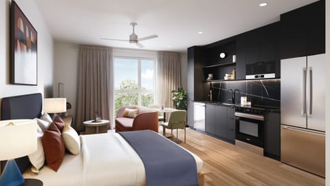 Modern studio featuring a ceiling fan, TV, and contemporary decor. (The Code -132)