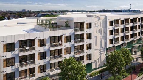 Exterior of the hotel with multiple units.