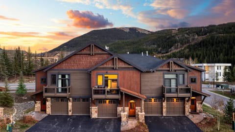 Front exterior of the home with mountain view.