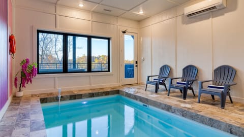 Take a dip in your private indoor pool—perfect for year-round fun.