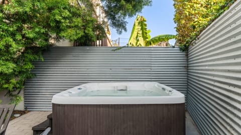 Unit 2: Private patio with hot tub.