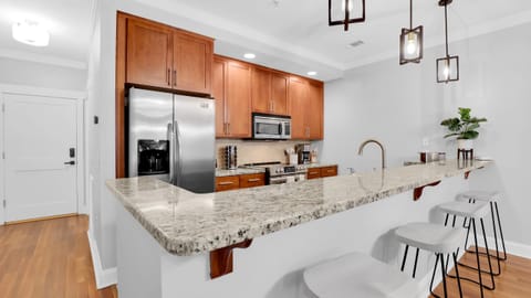 Enjoy casual dining and conversations at the kitchen counter.