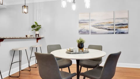 Gather for meals or morning coffee in this bright, open dining space just off the kitchen.