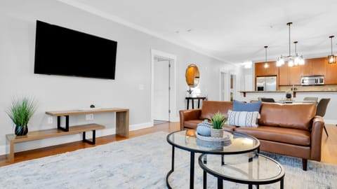 Bright, open-concept living area featuring modern design, warm finishes, and plenty of space to unwind.