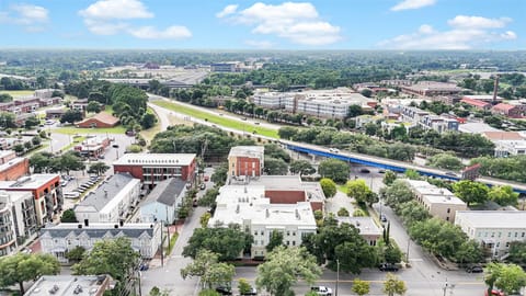 Aerial view showing the property’s neighborhood and nearby city landmarks.