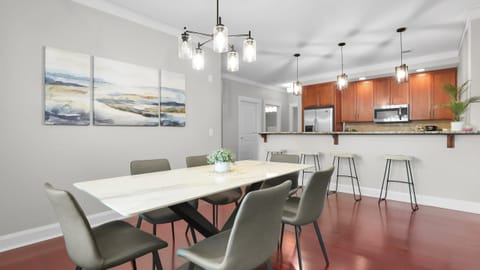 Gather for meals or unwind in this sunlit open-plan space.