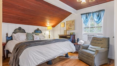 The primary bedroom features a king bed.