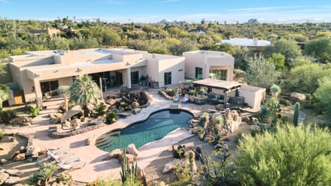Desert luxury at its finest—expansive estate with a resort-style pool and panoramic views.