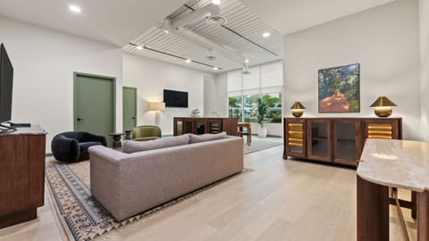 Relax in this thoughtfully designed lounge space featuring cozy seating, modern finishes, and plenty of room to unwind after a day of exploring.