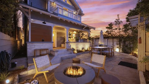 Golden-hour fire pit hangs in your private outdoor oasis.