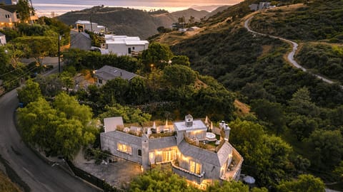 Sunset view of the canyon and ocean horizon.