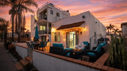 Beautifully lit exterior showcasing the home's unique character.