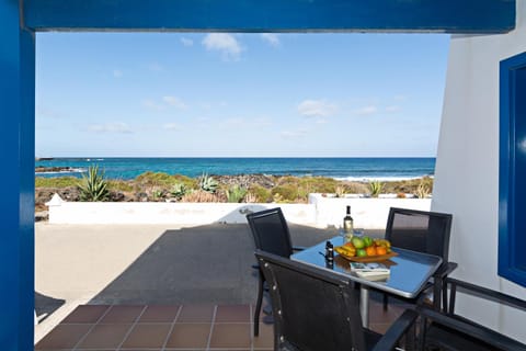 View (from property/room), Balcony/Terrace, Seating area, Sea view