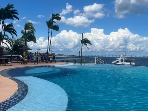 Apartamento no tropical executive hotel com varanda, 1 cama de casal e 2 camas de solteiro Apartment hotel in Manaus