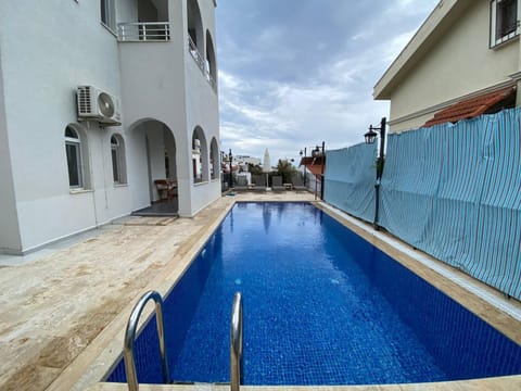 Flat with Shared Pool and Garden in Kalkan Antalya Eigentumswohnung in Kalkan Belediyesi