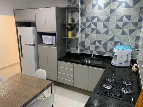 Kitchen or kitchenette, minibar, oven, stove