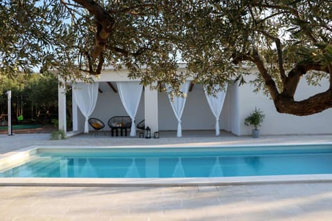 Dalmatian stone house with swimming pool near Supetar Villa in Split-Dalmatia County