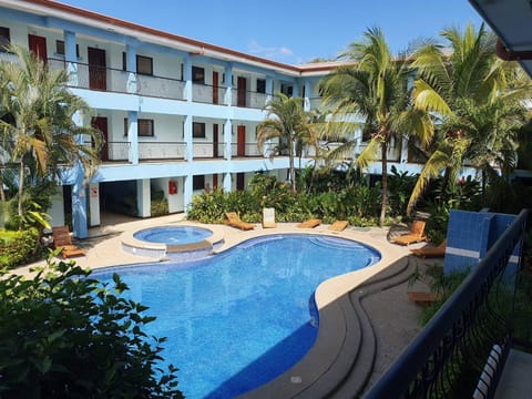 Property building, View (from property/room), Swimming pool, sunbed