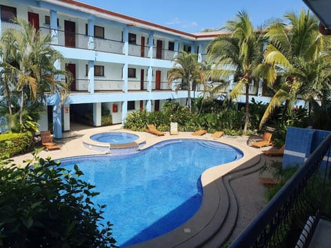 Property building, View (from property/room), Swimming pool, sunbed