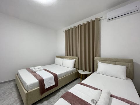 Bed, Photo of the whole room, Bedroom, towels, air conditioner