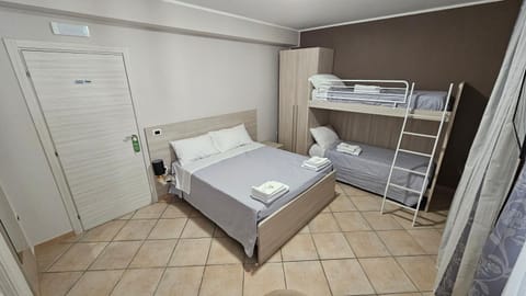 Bed, Photo of the whole room, Bedroom, bunk bed, towels, wardrobe