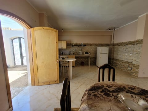 Dining area, minibar, oven, stove