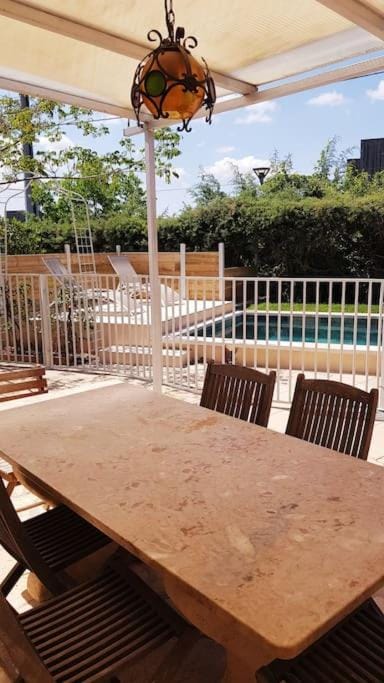 Patio, View (from property/room), Dining area, Swimming pool