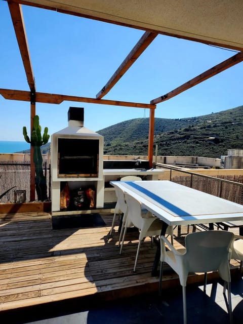 BBQ facilities, Balcony/Terrace, Seating area, Dining area, Mountain view, Sea view, Sunset