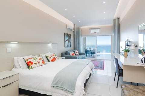 Bed, Living room, Seating area, Bedroom