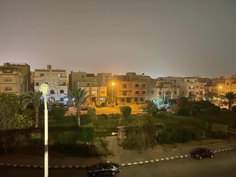 Property building, Night, Neighbourhood, City view, Street view, Location, Parking