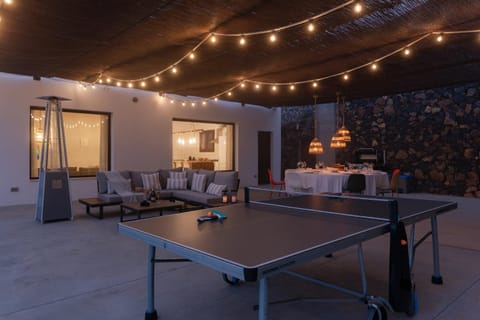 Patio, Table tennis, Living room, Seating area, Dining area