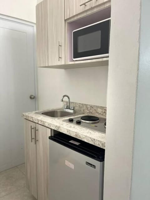 Kitchen or kitchenette, stove