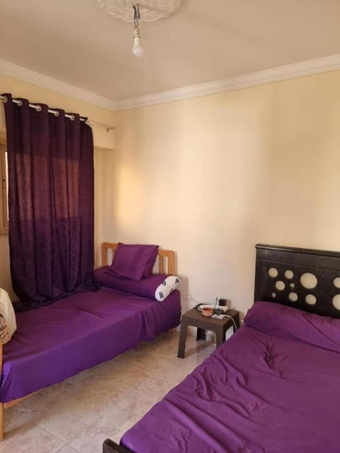 Bed in double room "no Egyptians" Alojamiento y desayuno in New Cairo City