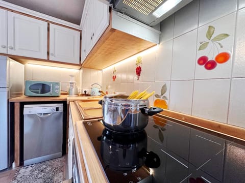 Kitchen or kitchenette, stove