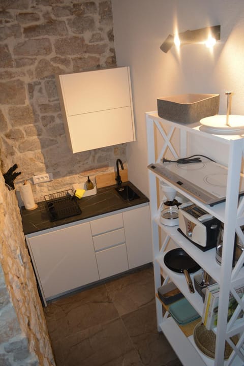 Kitchen or kitchenette, stove