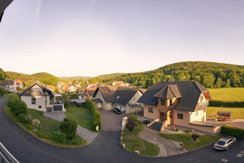 Property building, Day, Neighbourhood, Natural landscape, Bird's eye view, Mountain view, Street view, Location