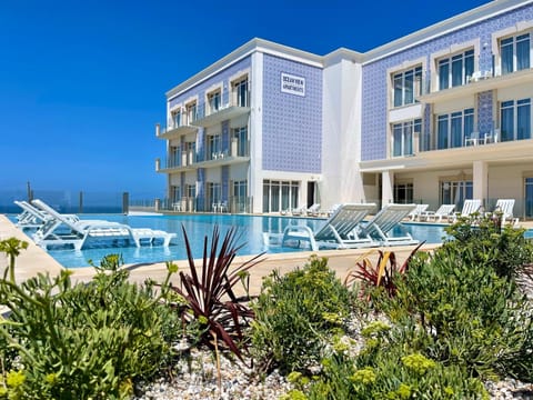 Property building, Pool view, Sea view, Swimming pool, sunbed