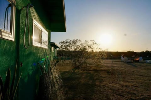 Shower, Property building, Natural landscape, Sunset