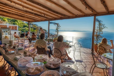 People, View (from property/room), Balcony/Terrace, Food and drinks, Food, Sea view