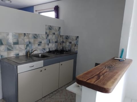 Kitchen or kitchenette, stove